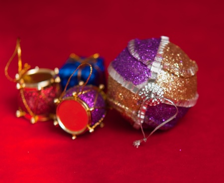 Varicoloured christmas balls on red  background  .の写真素材