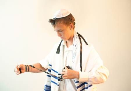 Religious Jewish teenager with a book in hand  の写真素材