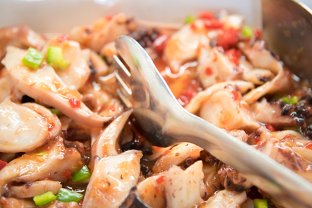 Salad seafood with calamari  in chill sauce .