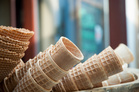 Many empty wafer sweet cornets for ice cream .の写真素材