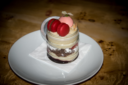 Beautiful dessert with ice cream, strawberries and muffin in a jar.の写真素材