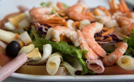 Fresh salad with shrimp, red cabbage and carrots .の写真素材
