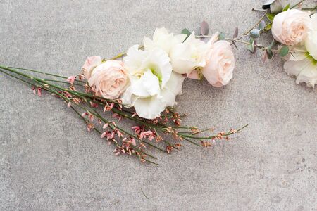 Tender spring flowers on gray background, copy space.の写真素材