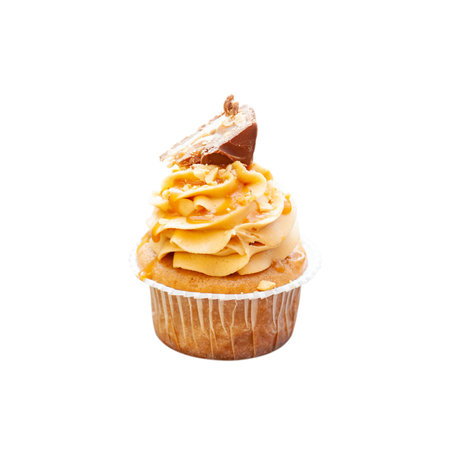 Homemade peanut butter cupcake with chocolate frosting, salted caramel and chocolate bar, isolated on white background, pngの写真素材