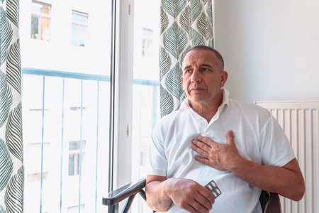 Portrait middle-aged man, with signs heart attack