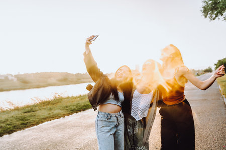 party young happy girls in natureの写真素材