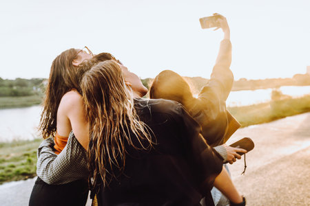 party young happy girls in natureの写真素材