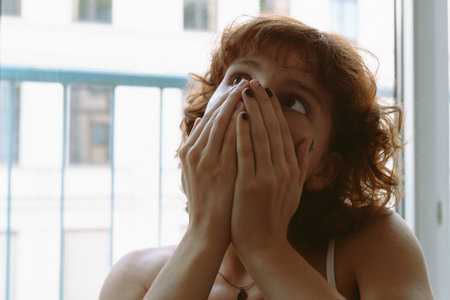 Portrait red-haired curly teenager girlの写真素材