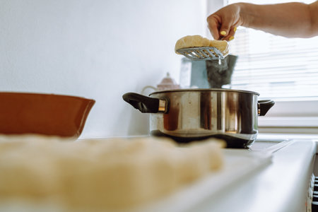 Boil lazy dumplings in boiling waterの写真素材