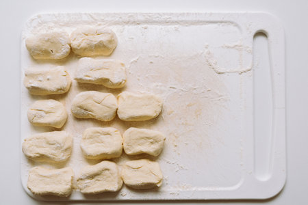 lazy dumplings on cutting boardの写真素材