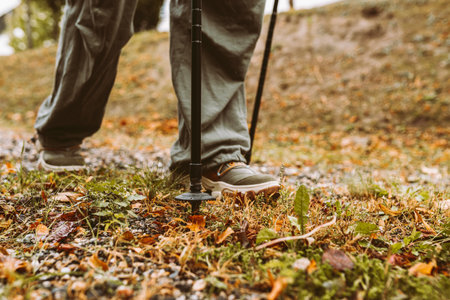 Nordic Walking in Autumn forest, hiking teenage girlの写真素材