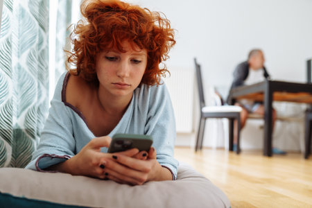 Portrait dreaming red-haired attractive teenager girlの写真素材