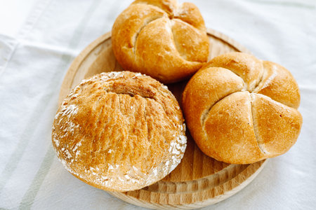 Kaiser buns made wheat dough, with golden crustの写真素材