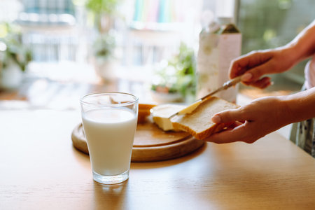 healthy breakfast milk bread and butterの写真素材