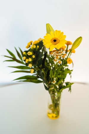 Bouquet of yellow flowers gerbera, chrysanthemum, lilyの写真素材
