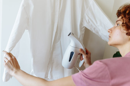 iron things with steam iron, steamerの写真素材