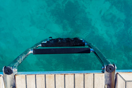 ladder into sea waterの写真素材