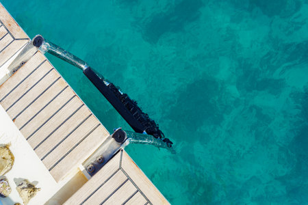 ladder into sea water from yachtの写真素材