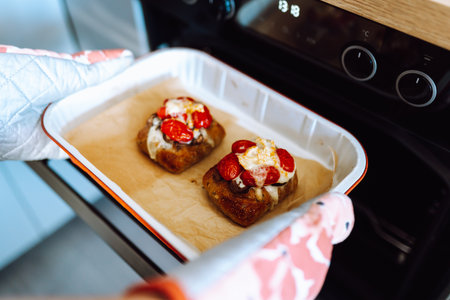 homemade bruschetta with tomatoes and cheeseの写真素材
