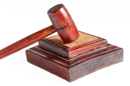 Wooden gavel of judge, close-up, white background, no people, horizontalの写真素材