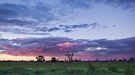 A beautiful sunset over farmlandの写真素材