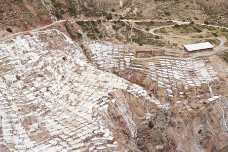 Aerial view of the terraces built by the Incas for salt extraction, which are still in useの写真素材