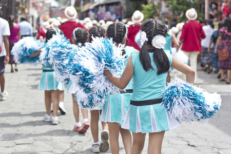 PANAJACHEL, GUATEMALA - SEPTEMBER 14, 2013: Students take part on a school parade celebrating the independence of Guatemala's anniversary. September 14, 2013 in Panajachel, Guatemalaのeditorial素材