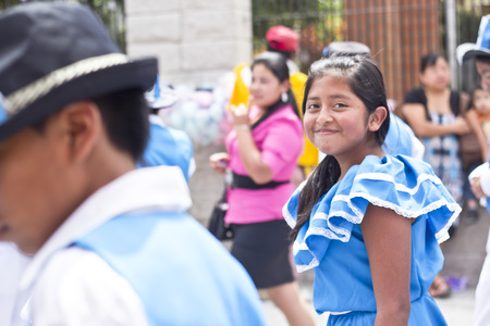 PANAJACHEL, GUATEMALA - SEPTEMBER 14, 2013: Students take part on a school parade celebrating the independence of Guatemala's anniversary. September 14, 2013 in Panajachel, Guatemalaのeditorial素材