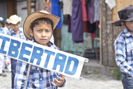 PANAJACHEL, GUATEMALA - SEPTEMBER 14, 2013: Students take part on a school parade celebrating the independence of Guatemala's anniversary. September 14, 2013 in Panajachel, Guatemalaのeditorial素材
