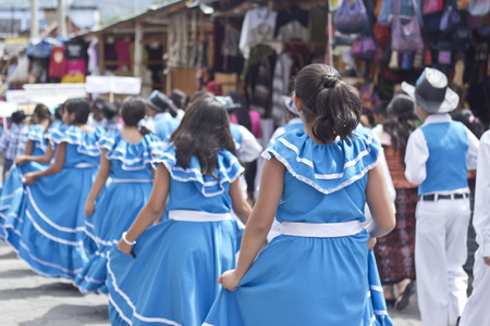 PANAJACHEL, GUATEMALA - SEPTEMBER 14, 2013: Students take part on a school parade celebrating the independence of Guatemala's anniversary. September 14, 2013 in Panajachel, Guatemalaのeditorial素材