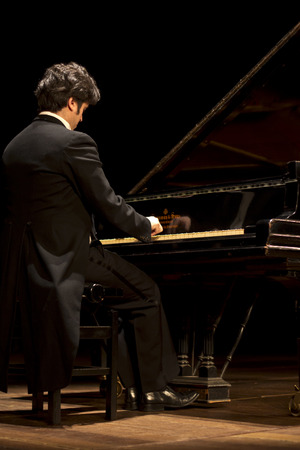 NITEROI, BRAZIL - APRIL 22, 2014: Brazilian pianist LuÃ­s Fernando Rabello performs his recital after a ten year gap. April 22, 2014 in Niteroi, Brazilのeditorial素材