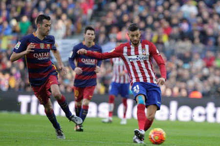 Sergio Busquets and Yannick Feirerra Carrasco During Liga match FC Barcelona - Atletico Madrid January 30, 2016 at the Camp Nou, Barcelona, Spainのeditorial素材