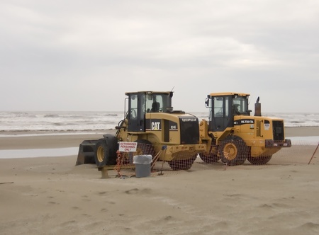 BP continues cleanup of Grand Isle, Louisiana beaches following the Deepwater Horizen oil spill in Aprilのeditorial素材
