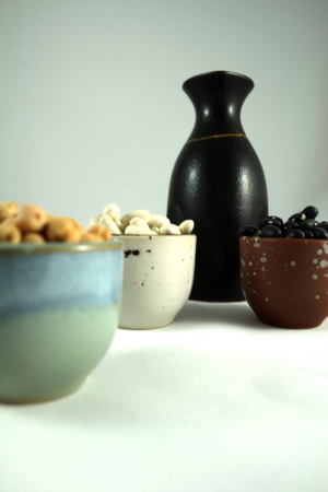 food in various cups and a pitcherの写真素材