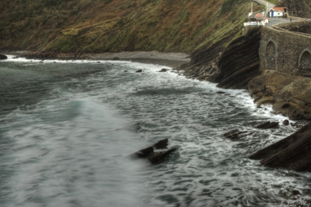 waves crashing against the shore