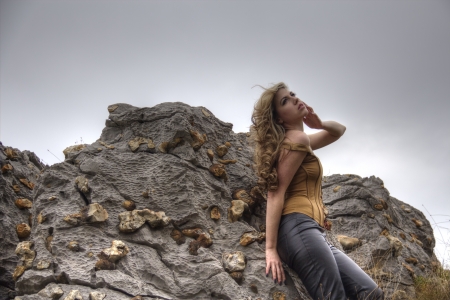 beautiful blond woman posing in a sensual wayの写真素材