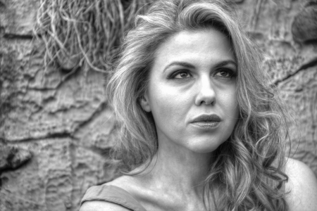 pretty blonde girl posing in natureの写真素材