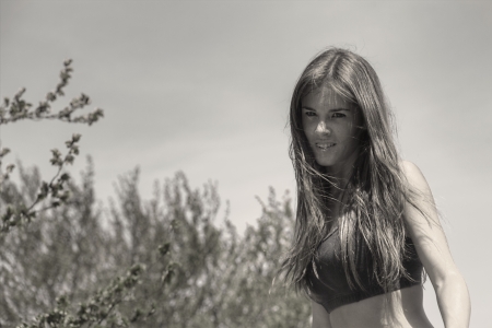 beautiful woman ascending a mountainの写真素材