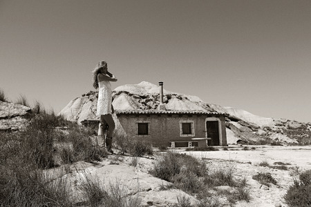 pretty girl posing in the desertの写真素材