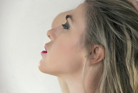 prety girl posing in riuined townの写真素材