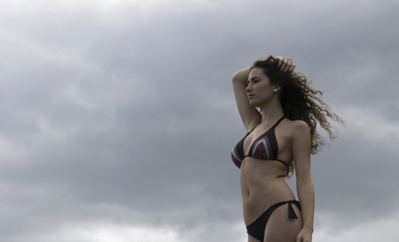 pretty girl posing in the beachの写真素材