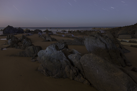 rocks in the coast at nightの写真素材