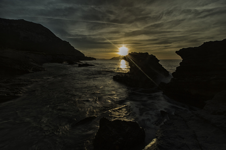 seaside in the sunset in spainの写真素材