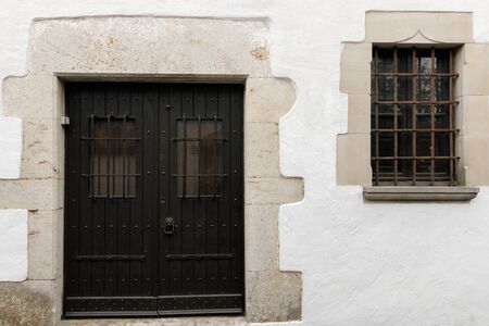 ancient door in a medieval townの写真素材