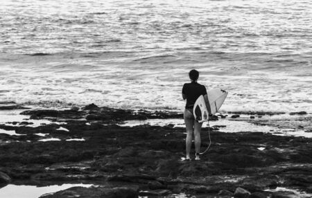 young people going to the seaの写真素材