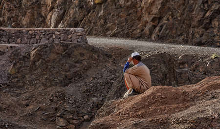 morocco 04 09 2018: man relaxing at sunsetのeditorial素材