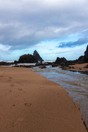 beauty beach in the coast of basque countrywith small wavesの写真素材