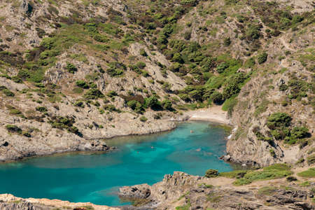 emerald colored bay in cap de creus on the costa brava in the province of girona a sunny summer dayの写真素材
