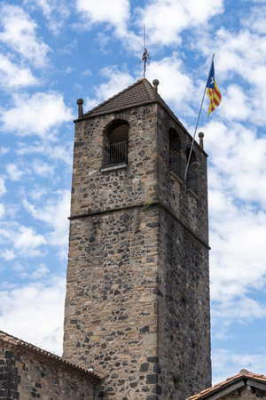Stone bell tower in a the town of Castellfollit de la Roca in Gironaの写真素材