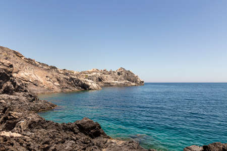 stone cove in cap de creus on a sunny summer dayの写真素材